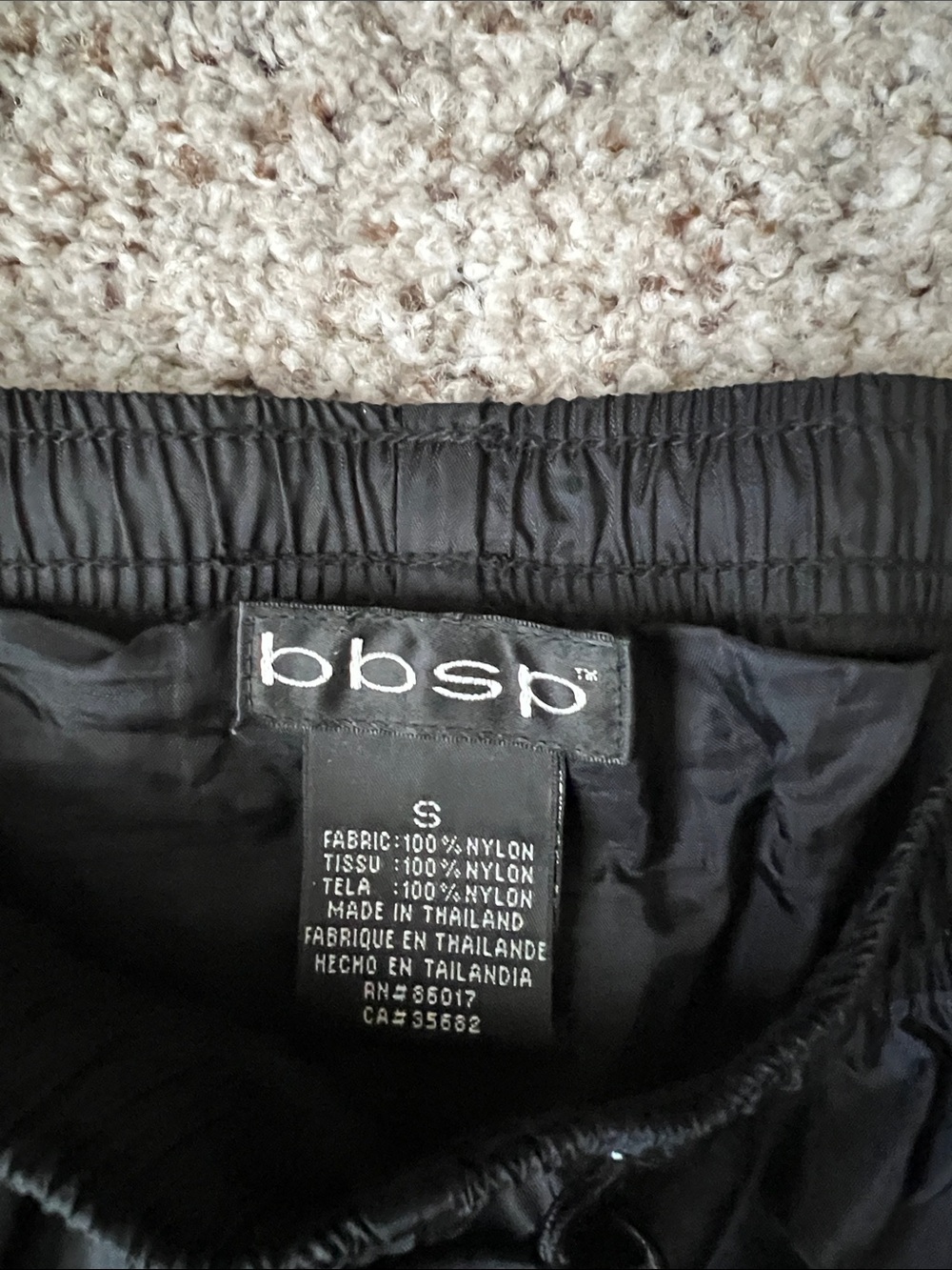 bebe Black Pants with White Side Stripes and Snap Details - Picture 2 of 2
